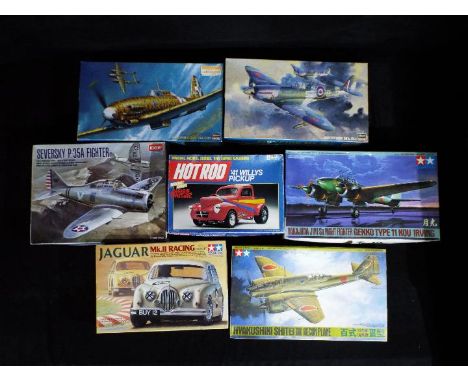 Tamiya, Academy, Revell, Hasegawa - Seven boxed plastic model kits in various scales. Lot includes Tamiya #159 1:24 Jaguar Mk