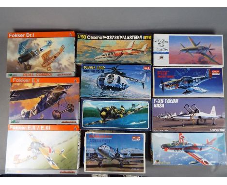 A good selection of boxed model kits, predominantly aircraft, by Hasegawa, Academy Minicraft, Fujimi, Heller and similar, var