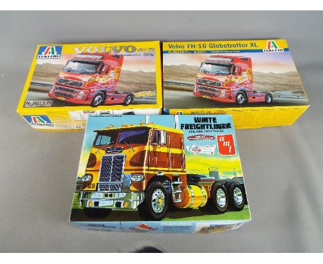 Three boxed model kits in 1:24 and 1:25 scale to include two Italeri Volvo FH-16 Globetrotter XL and an AMT White Freightline