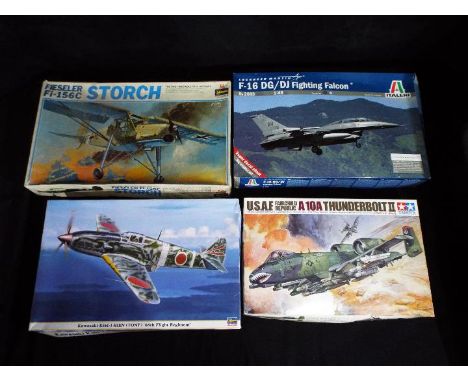 Tamiya, Hasegawa, Italeri - Four boxed plastic model aircraft kis in various scales. Lot consists of Hasegawa #08190 !;32 Kaw