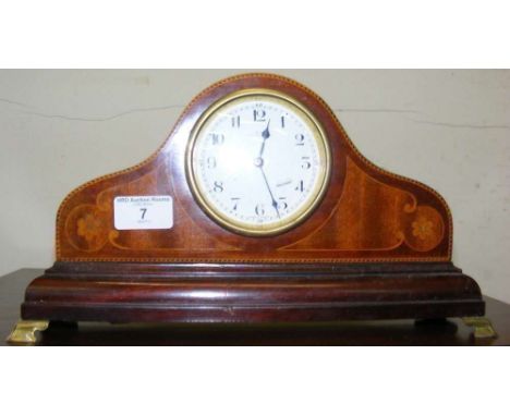 An Edwardian mantel clock with inlaid decoration