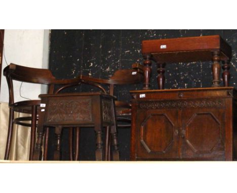 Two Bentwood armchairs, a carved oak worktable, oak cupboard, together with a commode