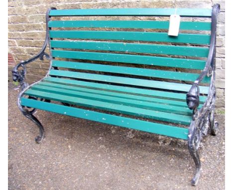 Wrought iron and wooden garden bench