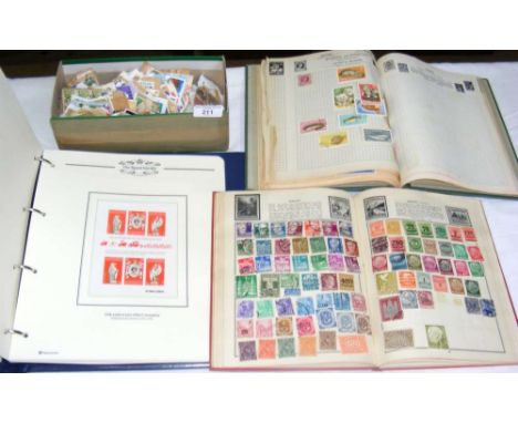 Royal Family Stamp Album, together with two others, plus box of loose Commonwealth stamps