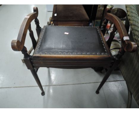 An Art Nouveau piano stool