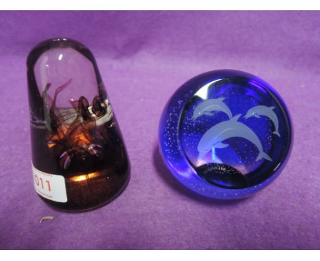 Two colour glass paper weights by Caithness