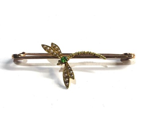 Antique 18ct gold seed-pearl and peridot dragon fly brooch measures approx 65mm by 25mm dragonfly xrt as 18ct gold pin tested