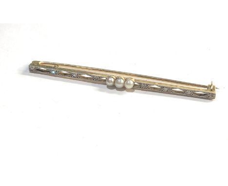 15ct gold and plat Edwardian pearl and diamond bar brooch  measures approx 6.6cm long 
