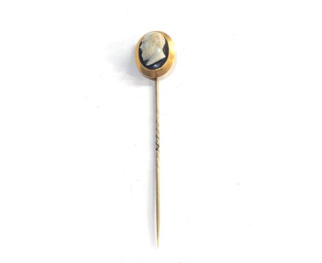 18ct gold hard stone cameo stick pin measures approx 8cm head measures approx 20mm by 15mm not hallmarked head tested as 18ct