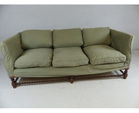 Antique upholstered sofa with barley twist frame legs