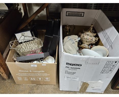 2 BOXES CONTAINING VARIOUS CERAMICS, LIDDED VASES NAO STYLE FIGURINE, EP CLARET JUG, CRYSTAL DECANTER, PLANTERS, EP PLACEMATS