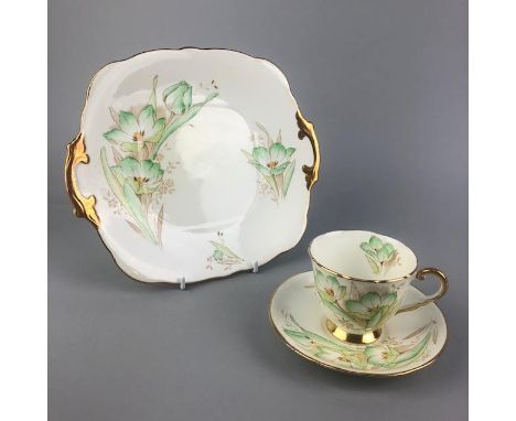 ROYAL STAFFORD TEA SERVICE, with green floral motif decoration, comprising eight cups, twelve saucers, twelve side plates, cr