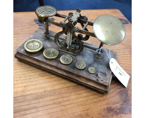 SET OF BRASS POSTAL SCALES, WITH WEIGHTS, by Samson Mordan &amp; Co, London, with thermometer and wooden base, 21.5cm wide