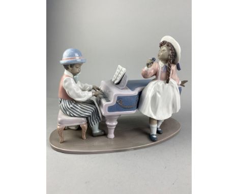 LLADRO GROUP OF A PIANIST AND SINGER, 32cm high, along with a cellist, drummer and three others (6)