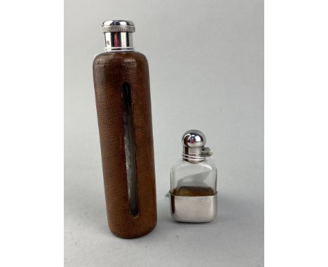 VICTORIAN CYLINDRICAL GLASS HIP FLASK WITH SILVER MOUNT, 18cm high, with leather cover, also a small perfume bottle with plat