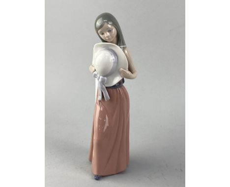 LLADRO FIGURE OF A GIRL HOLDING A HAT, 25cm high, along with three other Lladro figures and three Nao figures of geese (7)