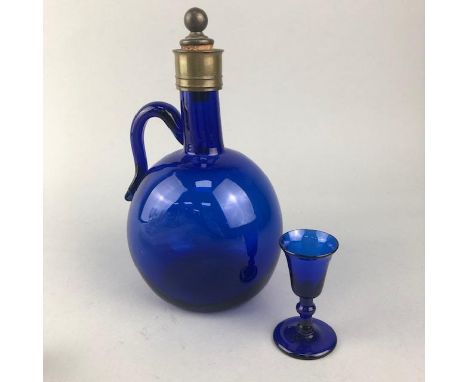 BLUE GLASS SPIRIT FLASK, 22cm high, along with a group of glassware including glasses, decanter and condiment dishes