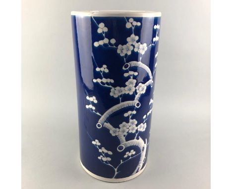 LATE 20TH CENTURY CHINESE STICK STAND, decorated in blue, with blossom in white, 42cm high