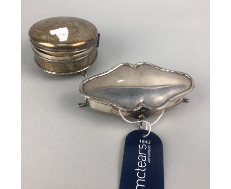 TWO SILVER TRINKET BOXES, one 120mm long, the other circular, 80mm diameter