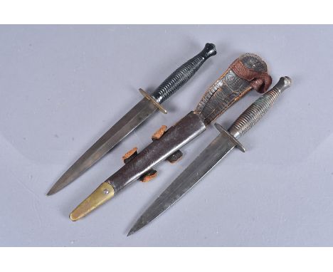 A Post-War Third Pattern Fairbairn Sykes fighting dagger by William Rodgers, with maker's stamp to the cross guard, complete 