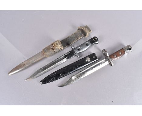 A British SLR bayonet, with broad arrow and 59 stamped to the blade, with partial serial to the painted grip '**6257 B' =, al