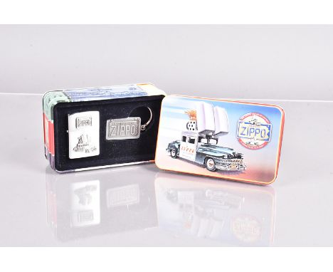 The Zippo Car, a 1998 Limited Edition Zippo lighter set, comprising a brushed chrome lighter with applied Zippo Car decoratio