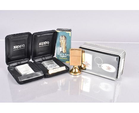 Two Zippo Lighters from the Japanese market, a Limited Edition Replica 1932 and a Millennium Dragon &amp; Diamond, a 1997 Zip