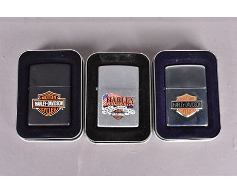 Harley Davidson, three Harley Davidson Motor Cycles Zippos, dated 2001, 2007 and 2008 (3) unused, not all lids are present wi