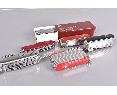 A collection of Victorinox Swiss Army Knives, of various sizes, together some other maker's (parcel) 