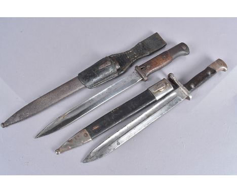 A German 1871 Simpson and Suhl Mauser bayonet, serial 18015, complete with scabbard (AF), together with a German 1916 double 