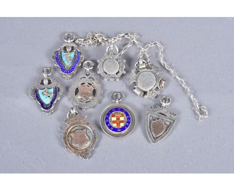 An assortment of silver and yellow metal fobs/medallions, 1920s and 1930s, for Junior Cup County Trophy Runners Up 1925-26, R