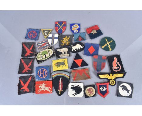 An assortment of cloth badges, to include Desert Rats, three 4th Indian Infantry Division printed badges, Supreme Headquarter