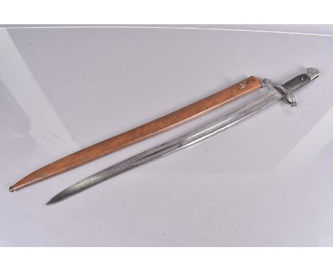 An 1856 British Artillery yataghan bayonet by Mills &amp; Co, with maker's stamp to the 58cm long blade, complete with brown 