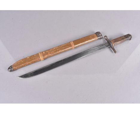 A Japanese Type 30 Arisaka bayonet, with Arsenal marks for Matsushita, with 39.5cm long single edged blade, with wooden/bambo