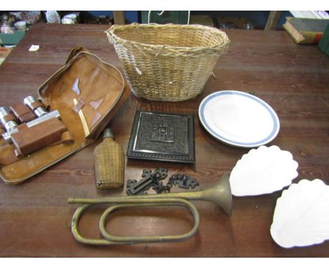 A bicycle basket of collectables inc Bugle