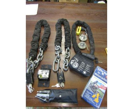 3 Heavy duty motorbike locks with keys and anchor and squire locks, helmet locks with keys, first aid kit, touring map