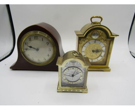2 x Swiza carriage clocks and a wooden cased small mantel clock