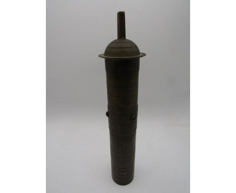 A brass Oriental spice grinder