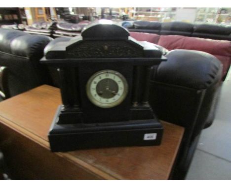 A 19th century black marble mantel clock