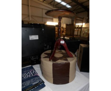 A tripod table and a pouffe