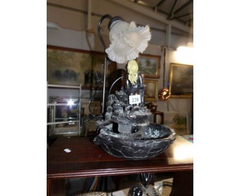 A water feature lamp