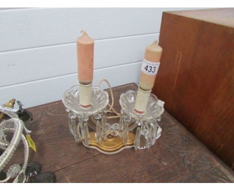 A chandelier style table lamp