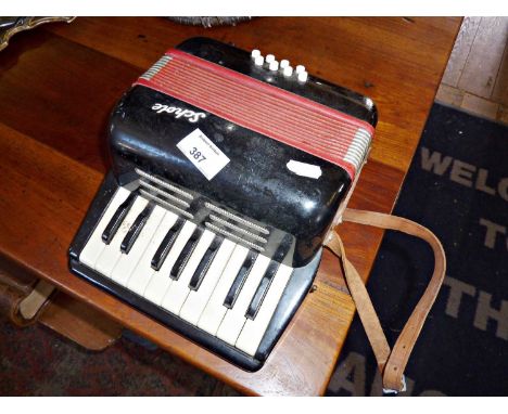 A "Schole" student's accordion