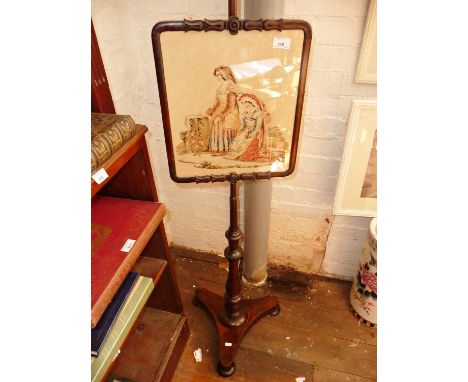 19th c. rosewood pole screen with tapestry panel of two ladies in carved frame above turned column on trefoil platform base
