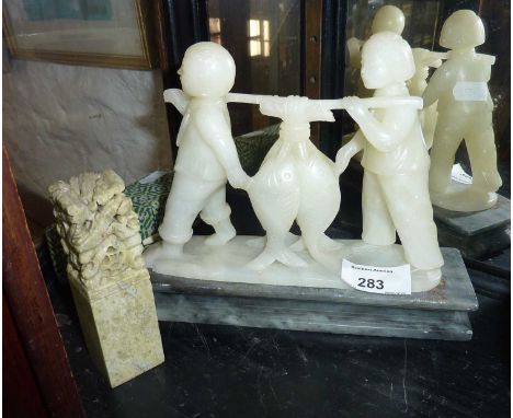 Chinese soapstone figures of fishermen with catch and a chop seal