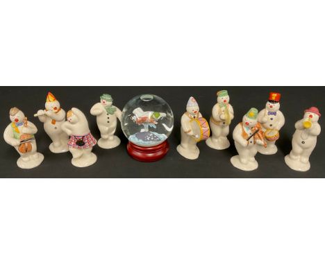 Royal Doulton Snowman figures - Violinist, Flautist, Trumpeter, Cellist, Drummer, Bass Drummer, Cymbal player, Snow Globe etc