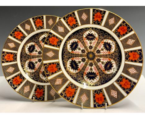 A pair of Royal Crown Derby Imari 1128 pattern dinner plates, 27cm diameter, printed marks in red, first quality