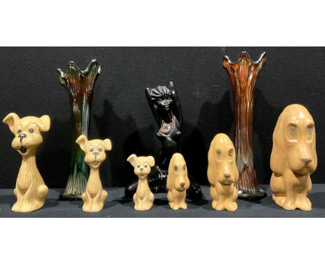 A trio of Sylvac pottery graduated models of a stylized dog, number 5295, 5296, 5297 others 2951,etc;  pair of carnival glass