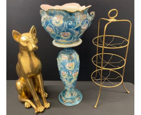 An Art Nouveau C. Brothers 'Tapestry' Ware jardiniere and stand, 83cm high, c.1900; an early 20th century brass plate stand, 
