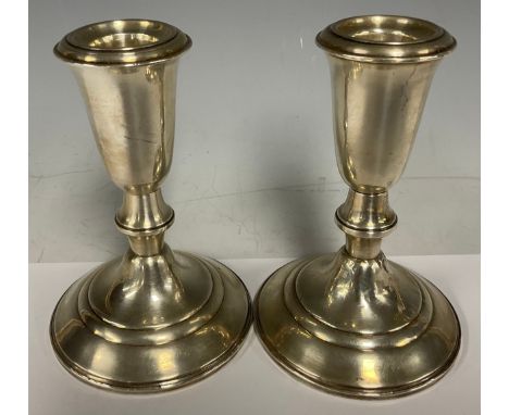 A pair of American silver candlesticks